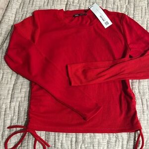 Zara top. Red Cinch sides with tie. Red. Size L